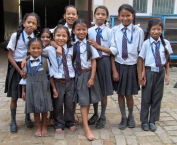 girls of poverty with school uniforms