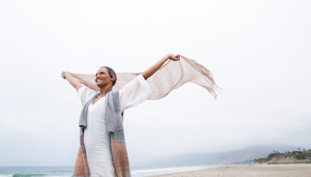 Senior woman enjoying the beach