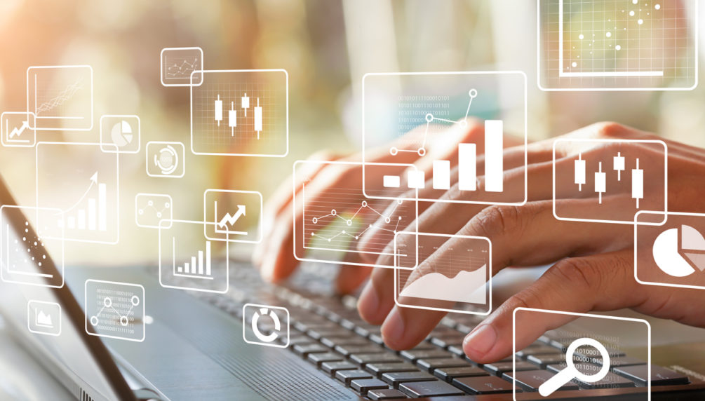 Business intelligence concept. Big data analytics, chart and graph icons and female hands typing on laptop.